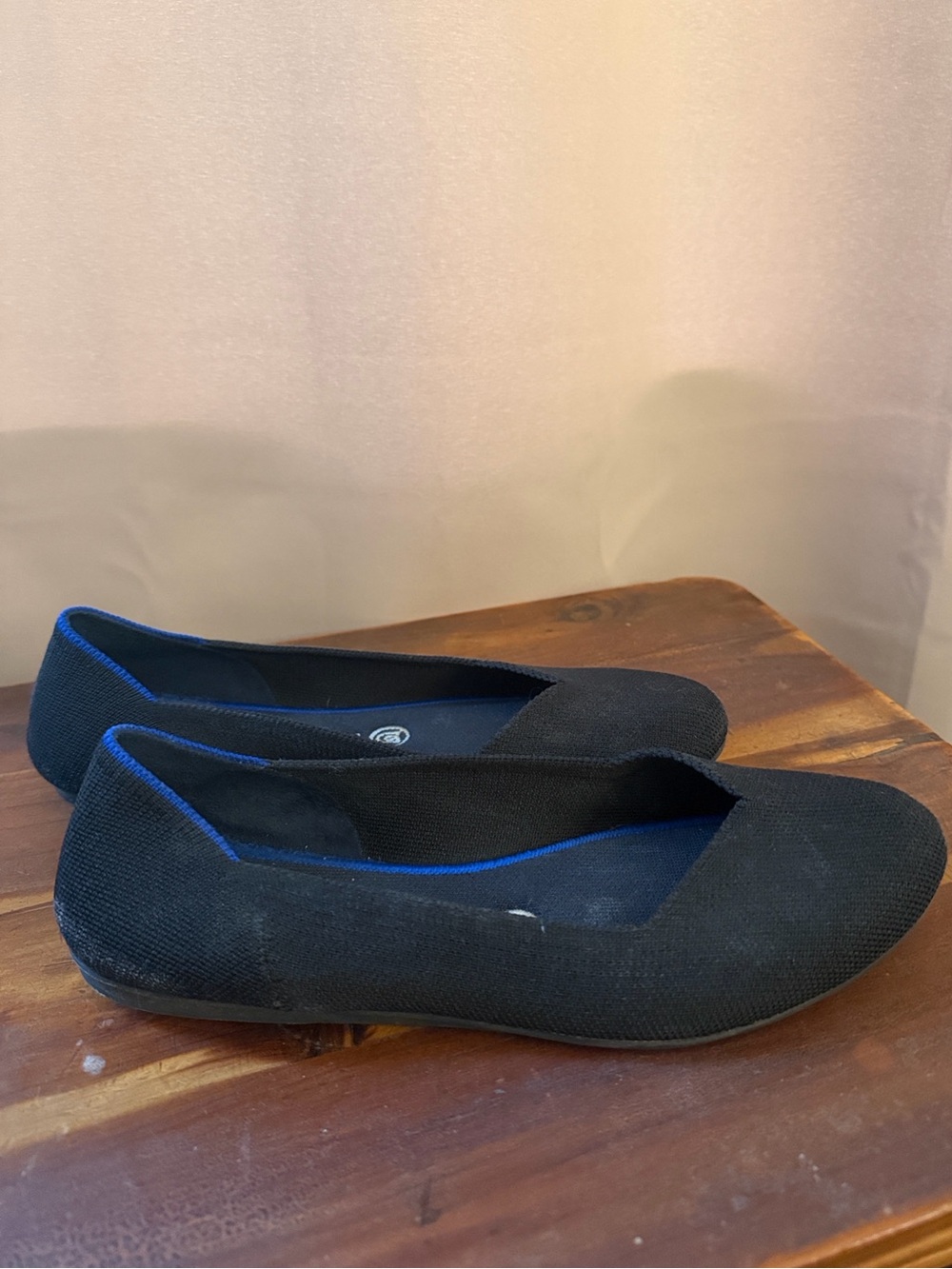 Rothy’s Black Women's Ballet Flats with Blue Trim